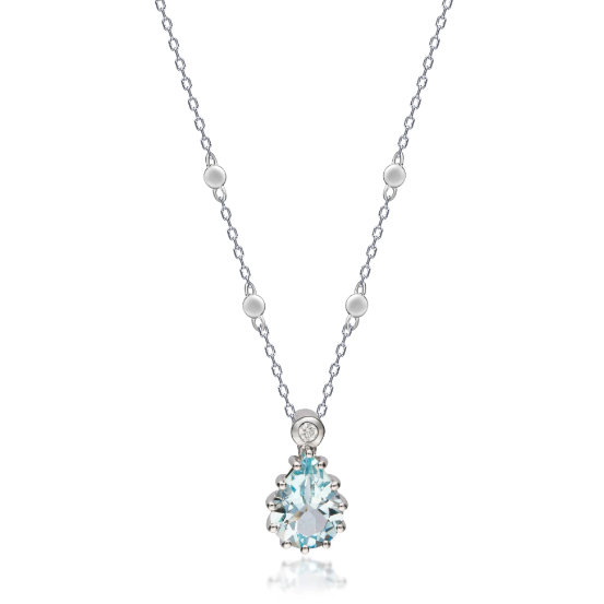 A gold pendant with an aquamarine gem