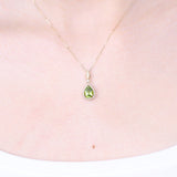 Violet 14K Yellow Gold Pear-Cut Manchurian Peridot Pendant